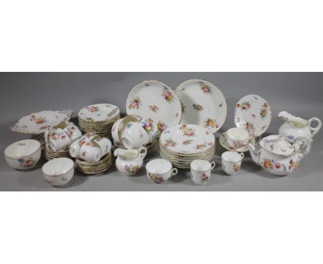 An early 20thC Coalport part service, to include footed serving dish, 27cm wide,  serving plates, teapot, cream jug, cups, sa