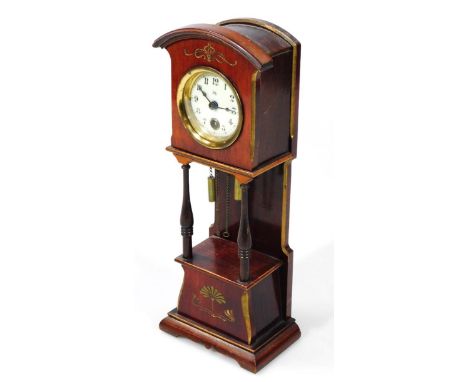 An early 20thC mahogany cased miniature longcase clock, with 5cm dia Arabic dial centred by a winding hole, with two cylindri