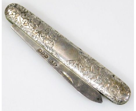 An all over silver Victorian fruit knife, with engine turned body, (vacant) shield shape cartouche and plain blade, Birmingha