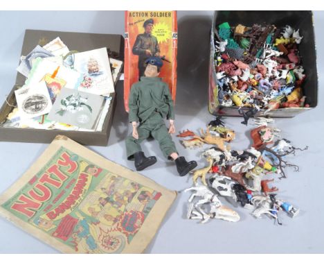 A Palitoy Mid 20thC Action Man boxed figure, partially clothed, 28cm high, a pressed card Cadbury's Carnival chocolates box, 