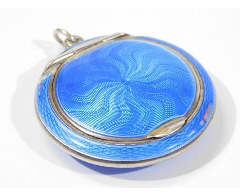 A silver and enamel compact, set with blue enamel (AF), Birmingham assay, maker H&A, 5cm wide. 