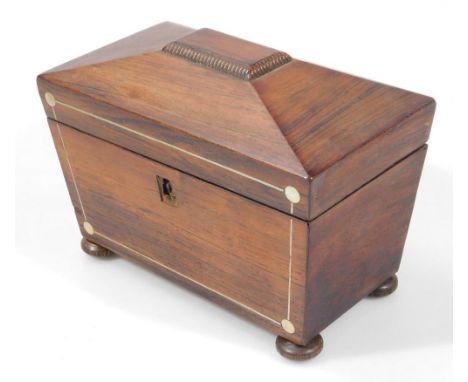 A mid 19thC rosewood sarcophagus shaped tea caddy, of small proportion, the hinged lid revealing a two sectional interior on 