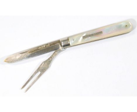 An Edwardian silver and mother of pearl handled campaign folding fork and knife set, of typical outline, Sheffield 1905, (whe