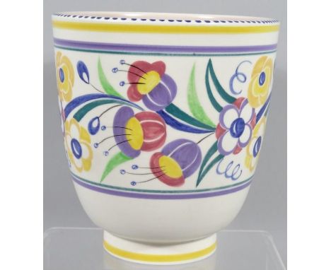 A modern Poole jardiniere, no.180, of egg shaped outline transfer printed with flowers in yellow, blue, purple and green, pri