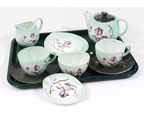 A Carltonware Australian design hand painted bachelor's tea service, raised with flowers on turquoise ground, to include a te