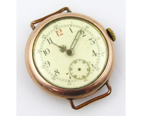 A 9ct gold wristwatch head, with a white enamel dial, lacking hand, and yellow replacement glass, bezel wind, unmarked, 28.9g
