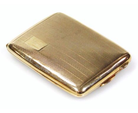 A George V 9ct gold match case, of oblong outline with thumb grip handles, partially engine turned with vacant cartouche, Lon