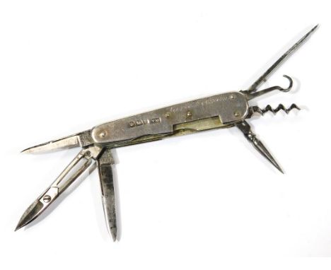 A Victorian silver pen knife, with various tools, to include button hook blade, etc, in base metal with silver body, Sheffiel