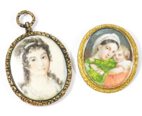 A portrait locket and brooch, the memorial locket with hand painted figure of a lady, with memorial hair lockets to the rever