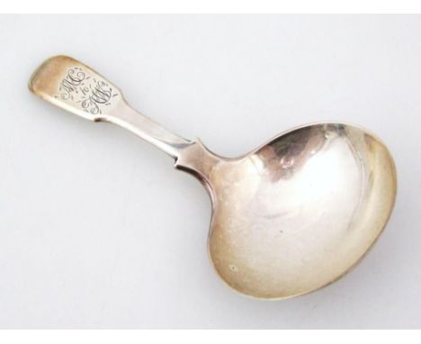 A Victorian silver caddy spoon, by Samuel Hennell, Fiddleback pattern, initialled, London 1843, 8cm wide, ½oz.