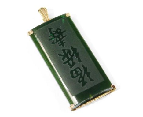 A Chinese jade pendant, of rectangular outline, set with three character mark, with yellow metal mount, 5cm high.