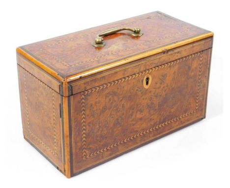 A George III burr yew and inlaid tea caddy, of rectangular outline, with shaped handle, the hinged leather backed lid reveali