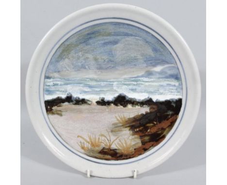 A 20thC Highland Stoneware hand painted plate, of circular outline with seascape pattern, polychrome decorated with a plain l