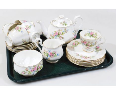 A Royal Albert Moss Rose pattern tea service, comprising teapot, 16cm high, milk jug, sugar bowl, side plates, cups and sauce