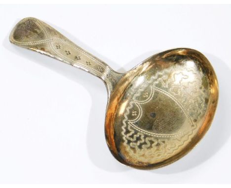 A George III silver caddy spoon, bright cut Old English pattern, with shield bowl, Birmingham 1796, 7cm wide.