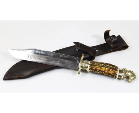 A reproduction horn handled dagger, with chrome mounts, the blade marked Wostenholm & Sons, Sheffield, partially etched The U