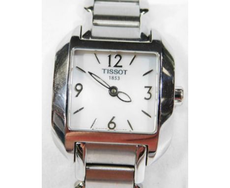 A Tissot ladies wristwatch, with mother of pearl effect square watch head, on a stainless steel bracelet, marked 1853, with e