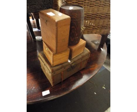 A miniature leather bound canvas steamer trunk with internal tray together with four wood advertising boxes 