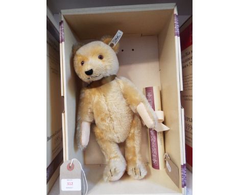 A boxed Steiff limited edition collectors club 'Baby Bear' No 5250 with golden mohair, pink pad and white label complete with
