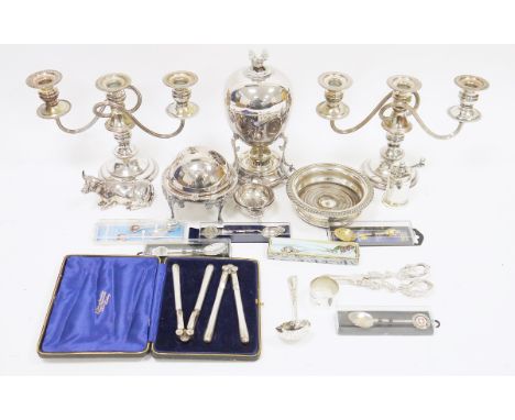 Italian silver plated model of a cow, a silver plated pepper grinder, a pair of three-branch candelabra, a silver plated wine