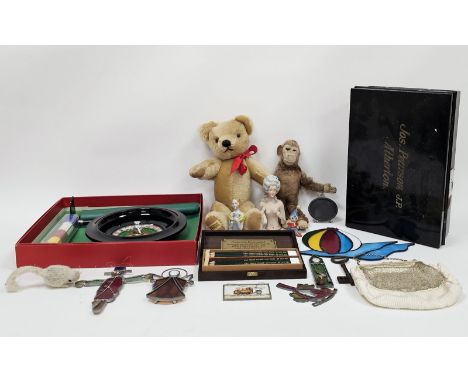 Merrythought gold teddy bear, brown plush and felt soft toy monkey, two porcelain half-figures, a Merit Deluxe Roulette&nbsp;