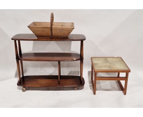 20th century Ercol three-tier occasional table&nbsp;on castors, 91cm wide,&nbsp;a tile-top coffee table and a trug&nbsp;(3)&n