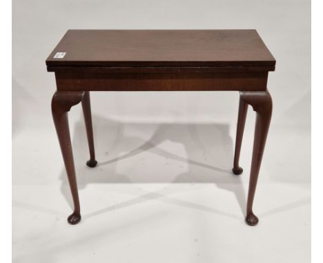Georgian-style mahogany folding rectangular games table, the hinged top with floral tapestry cover and floral tapestry mount,