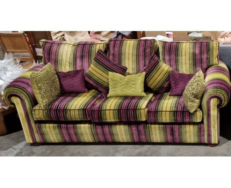 Duresta three-seater sofa&nbsp;covered in a multi-coloured fabric, with a selection of cushions, 225cm wide&nbsp;