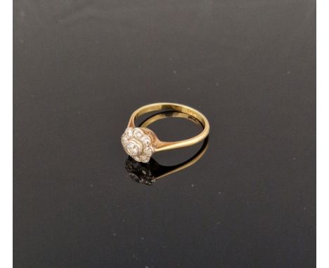 18ct gold and diamond cluster ring, having nine stones, circa 1920's  Condition Report Ring size - R/SGood overall condition.
