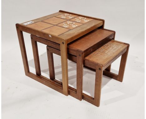 Nest of teak trio coffee tables, rectangular, the tallest with tile inlay, 50cm wide&nbsp;