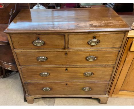 A George III mahogany chest, the rectangular top above two short and three long drawers on bracket feet
