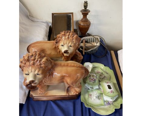 A pair of Staffordshire lions together with a part dressing table set, Jerusalem mirror, Welsh Bible, kayak and a table lamp