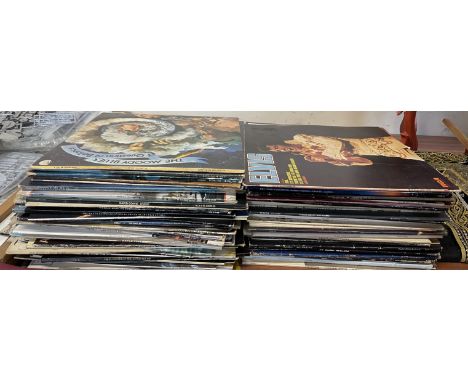 Assorted records by artists such as Cat Stevens, Donovan, Madonna, David Bowie, Bob Dylan, Phil Collins, Elvis, Genesis, Eagl