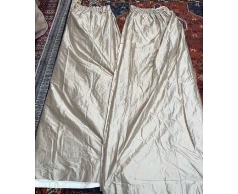 A pair of champagne silk full length curtains, with a pencil pleat top lined and interlined approximately 208 drop x  200cm w
