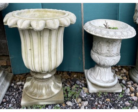 A reconstituted stone lorus leaf shaped urn on a square pedestal together with another moulded urn shaped planter