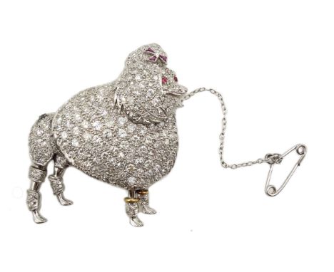 Platinum poodle brooch pave set diamonds, cabochon ruby eyes and calibre cut ruby bow, stamped P.T Condition Report &amp; Fur