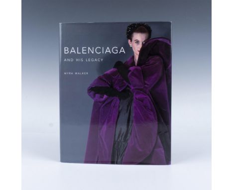 162 page hardcover book with a dust cover, exploring innovative designs and their lasting impact on fashion by Balenciaga, hi