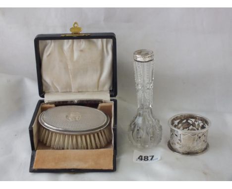 A pierced napkin ring, a mounted vase and a boxed  hair brush        