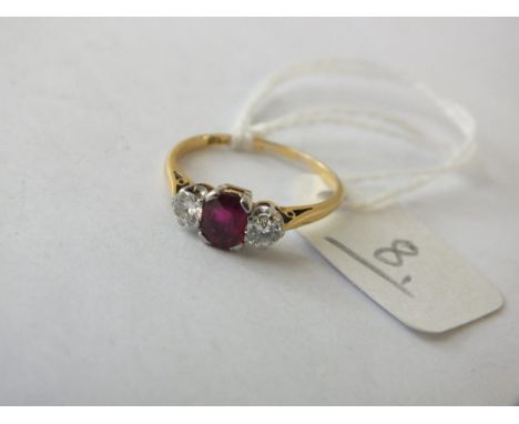 Three stone ruby and diamond ring set in 18ct  and platinum         