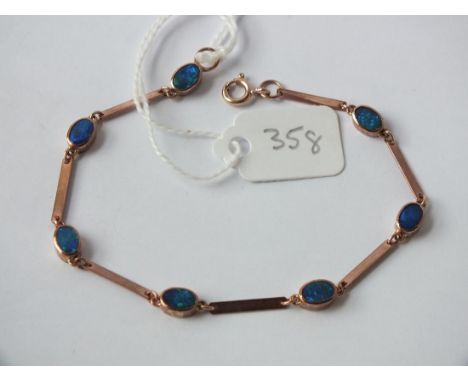 Opal doublet seven stone bracelet set in 9ct.  3.8g.   