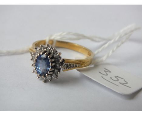 An oval sapphire and diamond cluster ring size O   