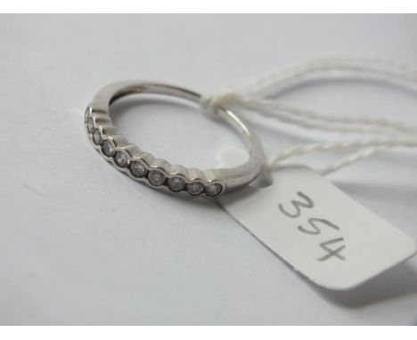 Diamond half eternity ring set in 18ct. size L   