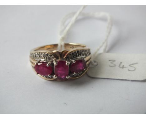 Similar design ruby and diamond 9ct. ring size M    