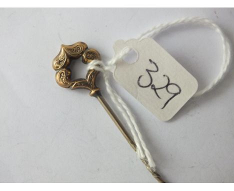Gold stick pin        