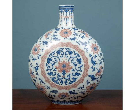 A Chinese moon flask, painted porcelain, decorated with a pink and blue floral pattern, with a Qianlong mark to the base, 33c