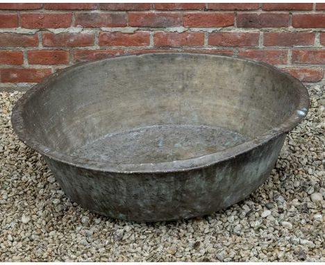 A large brass shallow basin, 98cm diameter x approximately 26cm highOxidised overall.