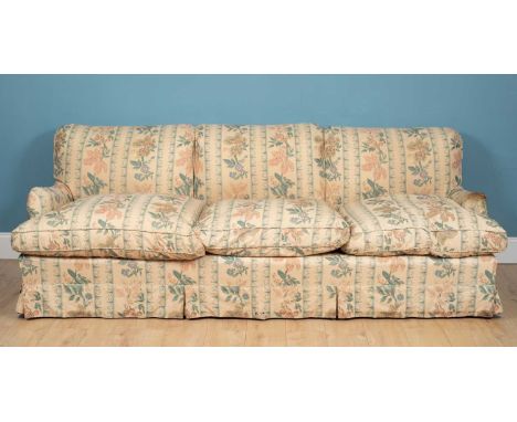 A large Howard Chairs Limited sofa, stamped to the back leg, 244cm wide x 118cm deep x 89cm highMarks, tears and stains to th