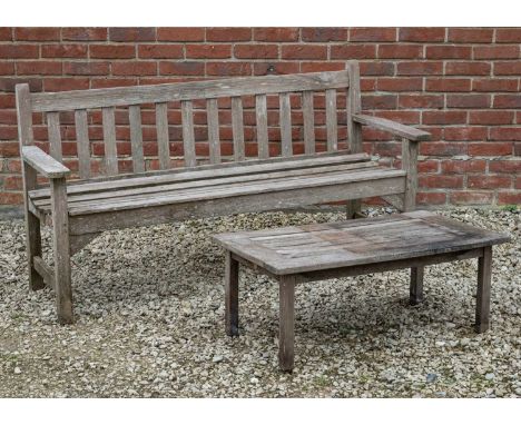 An R A Lister teak garden bench, 159cm wide x 82cm high; together with a 'Birling' rectangular topped teak low occasional tab