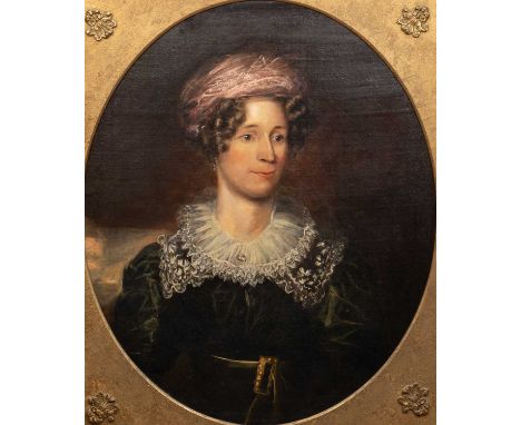 A portrait of an 18th century lady, oil on board, mounted in an oval giltwood carved and painted frame, with four carved addi