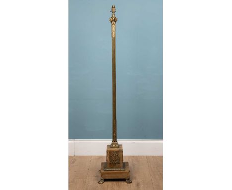 An Italian style brass standard lamp on a square plinth onyx base with clawed feet, 154cm x 30cmUsed condition, with marks, d